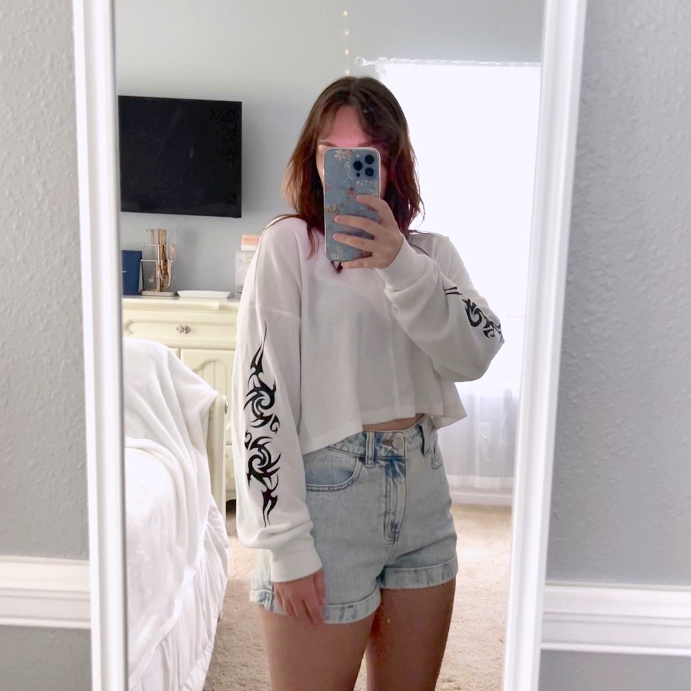 white long sleeve crop top with design